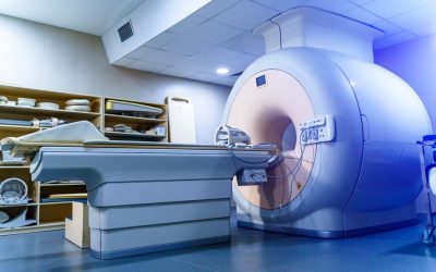Medical CT or MRI or PET Scan standing in the modern hospital laboratory. Technologically advanced and functional medical equipment in a clean white room.