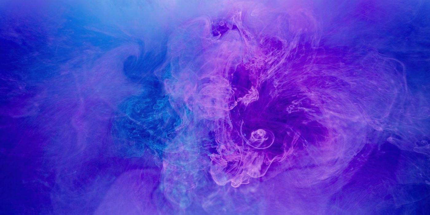 Color mist. Ink water. Vapor texture. Paint splash. Purple blue smoke cloud mix floating abstract art background with free space.